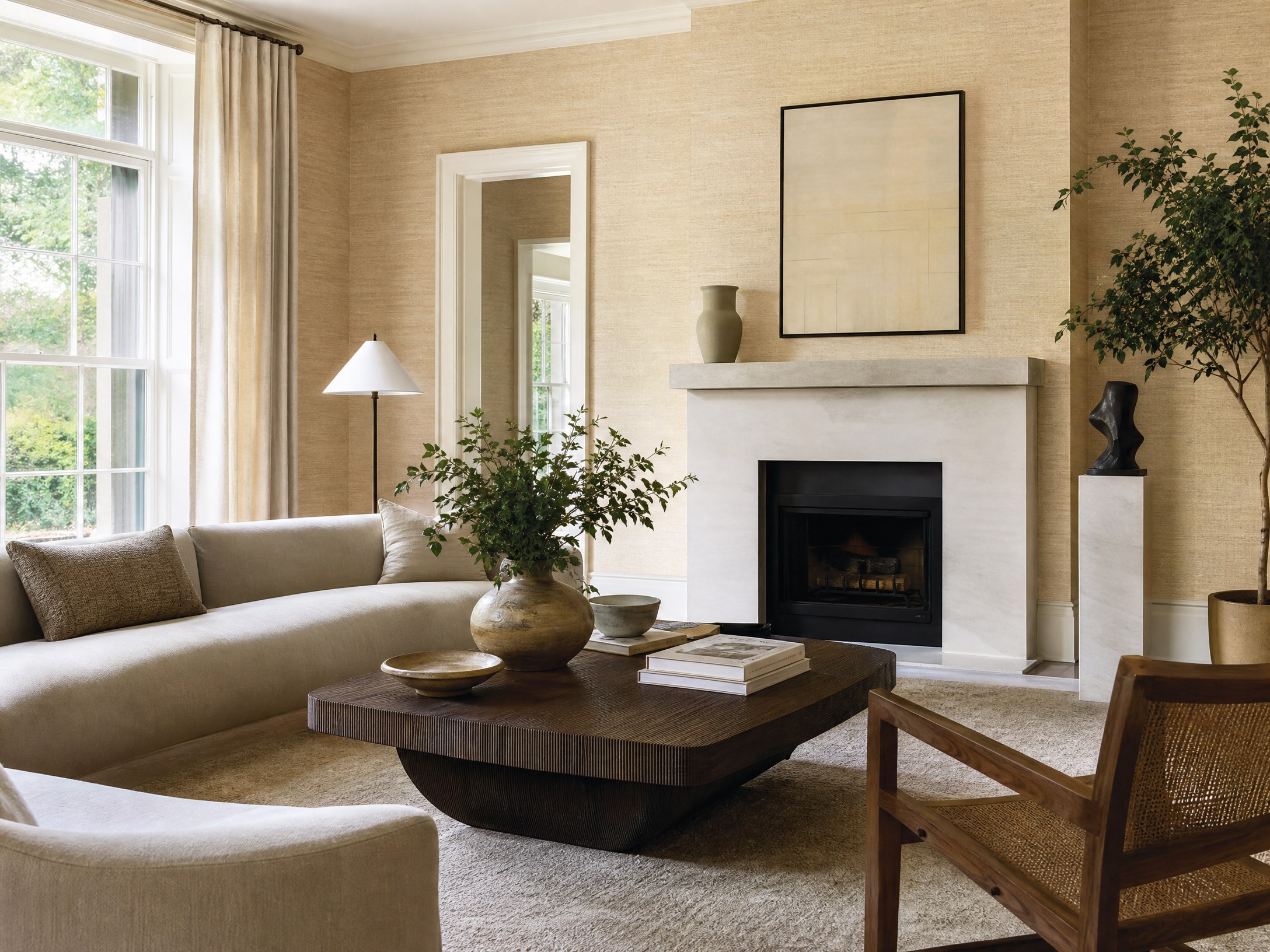 Ivory grasscloth wallpaper in an elegant living room